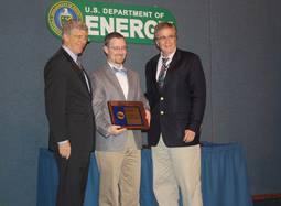 PECASE awardee Dr. John R. Kitchin with Deputy Secretary of Energy Daniel B. Poneman and Dr. Anthony Cugini, Director of NETL