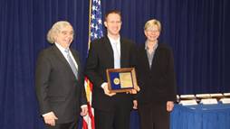 William Tisdale receives the Presidential Early Career Award for Scientists and Engineers from DOE Secretary Moniz and DOE Office of Science Director Murray.