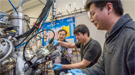 Berkeley Lab scientists Junqiao Wu, Changhyun Ko, and Fan Yang (l-r) are working at the nano-Auger electron spectroscopy instrument at the Molecular Foundry, a DOE Office of Science User Facility.