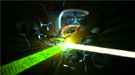 An optical laser (green) excites the iron-containing active site of the protein cytochrome c, and then an X-ray laser (white) probes the iron a few femtoseconds to picoseconds later.