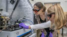 Berkeley Lab researchers Francesca Toma (left) and Johanna Eichhorn used a photoconductive atomic force microscope to better understand materials for artificial photosynthesis.
