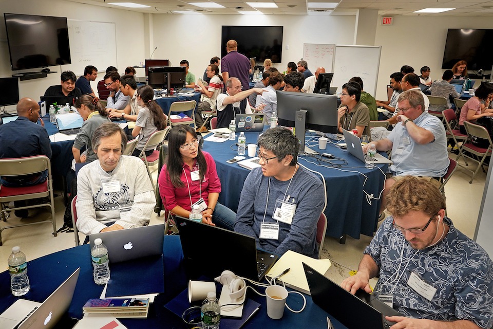 A group of people participating in a hackathon.